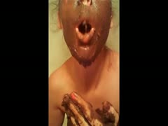 A filthy scat woman consuming her own feces